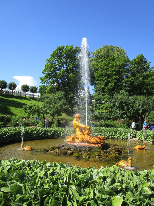 Golden fountain statue in Peterhof gardens