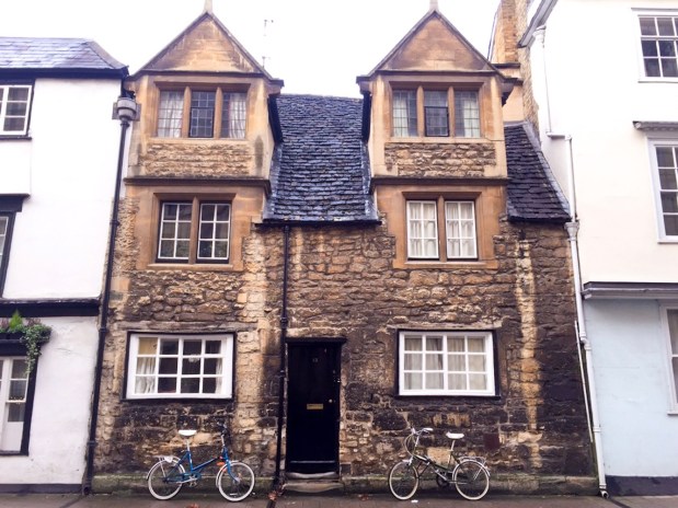 Bikes in front of an old stone house, Oxford